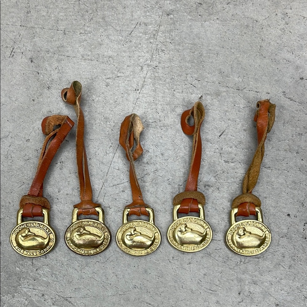 Dooney & Bourke Brass Fobs: set of 5